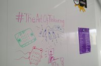 art of tinkering text and technology devices displayed on a whiteboard